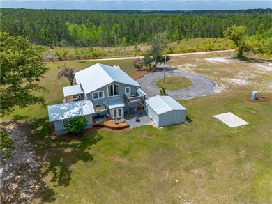 This Baxley property opens the door to something you don't come - photo 54