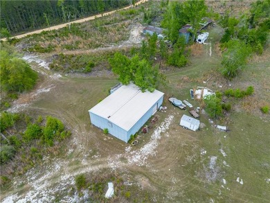 This Baxley property opens the door to something you don't come - photo 59
