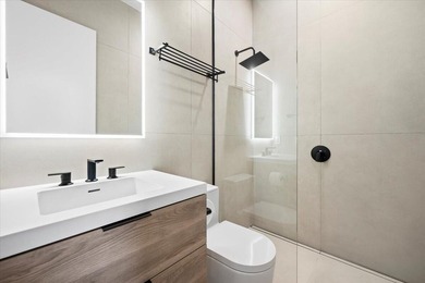 Wake up in this elegantly renovated villa tucked within the most - photo 14