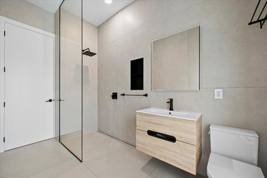 Wake up in this elegantly renovated villa tucked within the most - photo 16