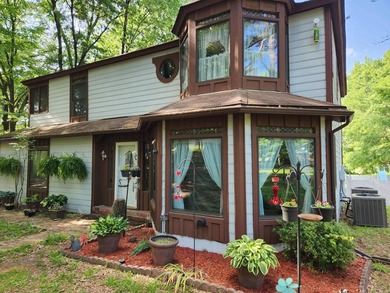 This enchanting Queen Anne-style home sits on 4.87 acres. The - photo 2