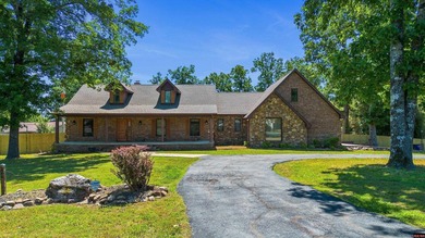 All-brick home offering space, privacy, and amenities! This - photo 1