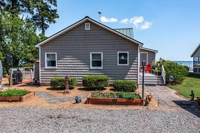 In the quaint waterfront community of Deltaville, where life - photo 5