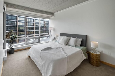 Wake up to beautiful sunrises in this bright, East-facing condo - photo 12