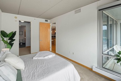 Wake up to beautiful sunrises in this bright, East-facing condo - photo 13