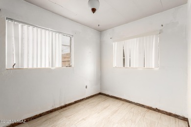 Welcome to an incredible opportunity at 418 E Roger Rd - a solid