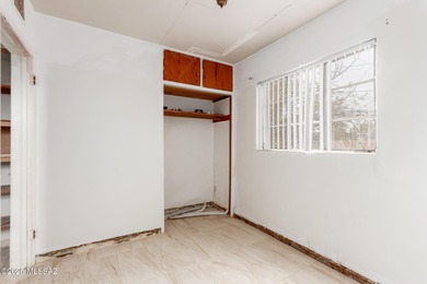 Welcome to an incredible opportunity at 418 E Roger Rd - a solid