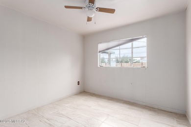 Welcome to an incredible opportunity at 418 E Roger Rd - a solid