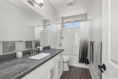 Easily mistaken for a Kahala home! This exceptional example of - photo 14