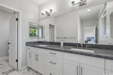 Easily mistaken for a Kahala home! This exceptional example of - photo 18