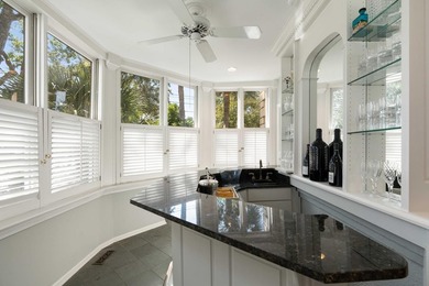 This spectacular home overlooking Colonial Lake was designed by - photo 21