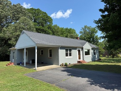 Welcome to this charming ranch-style home nestled on a peaceful - photo 3