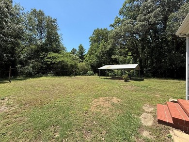 Welcome to this charming ranch-style home nestled on a peaceful - photo 4