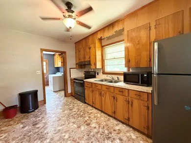 Welcome to this charming ranch-style home nestled on a peaceful - photo 8