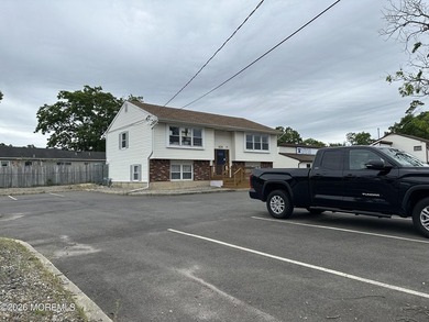 Prime location 3/10th of a mile from Garden State Parkway access - photo 2