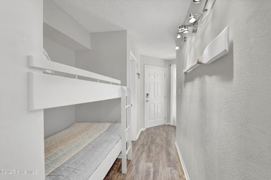 Step inside unit 1214 at 2000 New River Inlet Road, a