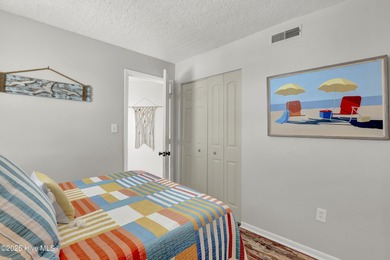 Step inside unit 1214 at 2000 New River Inlet Road, a