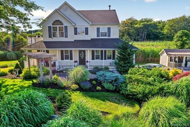 Here, at 266 Clinton Avenue, East Patchogue; a coastal haven - photo 1