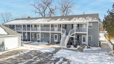 Fall in love with this 2-bedroom, 2-bath upper-unit condo - Lake Condo For Sale in Winneconne, Wisconsin