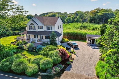 Here, at 266 Clinton Avenue, East Patchogue; a coastal haven - photo 4
