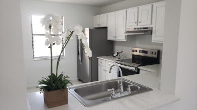 Lake Condo For Sale in Royal Palm Beach, Florida