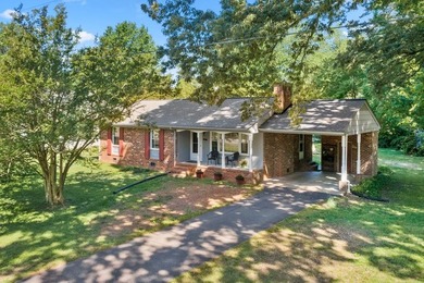 3 bedroom 1 1/2 bath brick rancher with attached carport and - photo 1