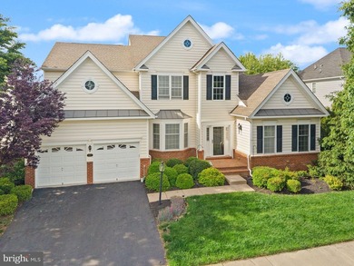 Situated on a premier lot within the prestigious, gated golf - photo 1