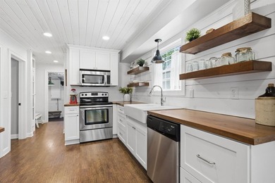 Step into the opportunity to own a beautifully restored classic - photo 11