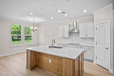 The Cherry Grove model offers a spacious and inviting retreat - photo 12