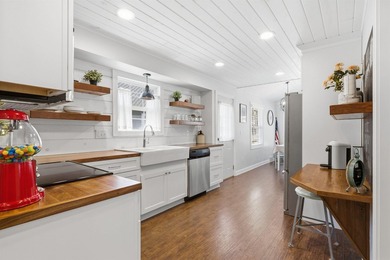 Step into the opportunity to own a beautifully restored classic - photo 12