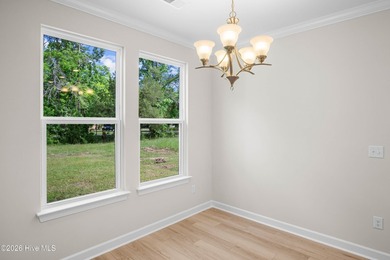 The Cherry Grove model offers a spacious and inviting retreat - photo 13