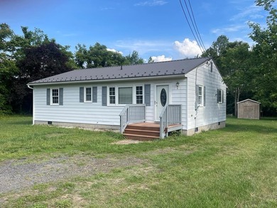 Try country living in this ranch-style 3-bedroom, 1.5-bath home - photo 1