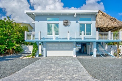 Beach House Paradise in Summerland Key. Nestled in one of the - photo 5