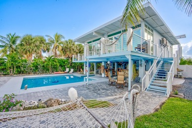 Beach House Paradise in Summerland Key. Nestled in one of the - photo 6
