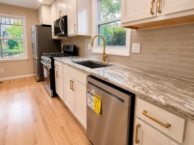 Completely reimagined from top to bottom, this stunning end-unit - photo 3