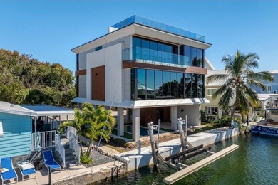 Experience the ultimate in modern waterfront luxury with this - photo 9