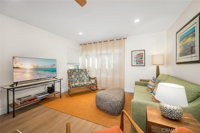Impeccably remodeled top-floor condominium in a fantastic