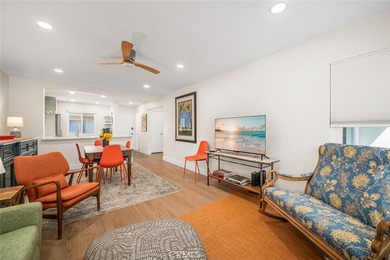 Impeccably remodeled top-floor condominium in a fantastic