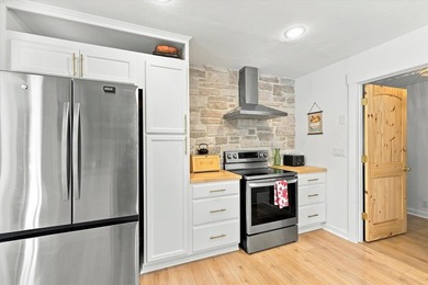 Welcome to this gorgeous 4-bedroom, 2-bath lakefront home - photo 21