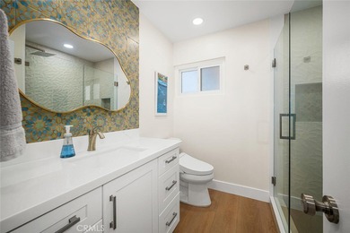 Impeccably remodeled top-floor condominium in a fantastic