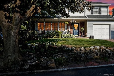 The brick driveway and lovely porch welcome you to this turnkey - photo 3