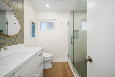 Impeccably remodeled top-floor condominium in a fantastic