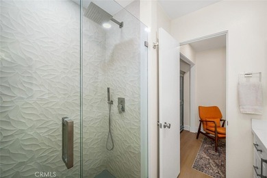Impeccably remodeled top-floor condominium in a fantastic