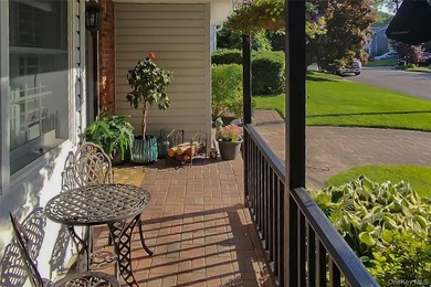 The brick driveway and lovely porch welcome you to this turnkey - photo 5