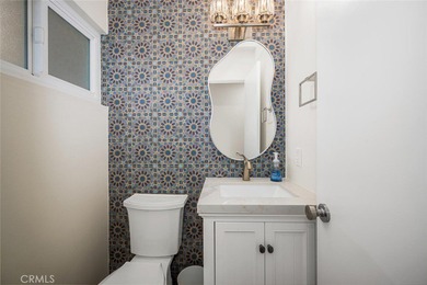 Impeccably remodeled top-floor condominium in a fantastic