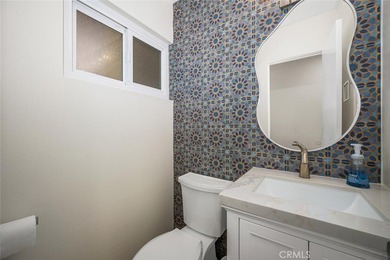 Impeccably remodeled top-floor condominium in a fantastic