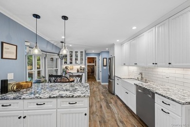 The brick driveway and lovely porch welcome you to this turnkey - photo 10
