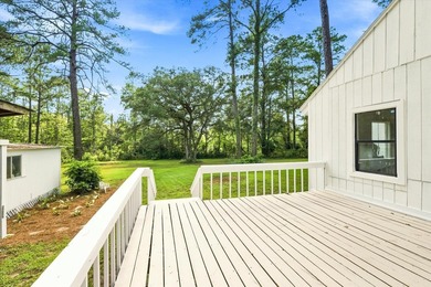 Welcome to this gorgeous 4-bedroom, 2-bath lakefront home - photo 46