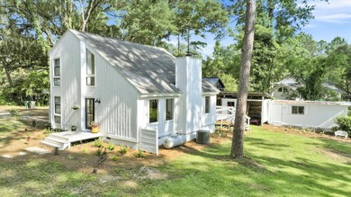 Welcome to this gorgeous 4-bedroom, 2-bath lakefront home - photo 49