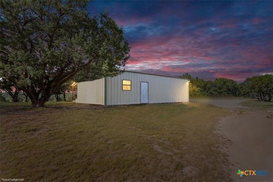 Country living meets endless possibilities on 15.7 scenic acres